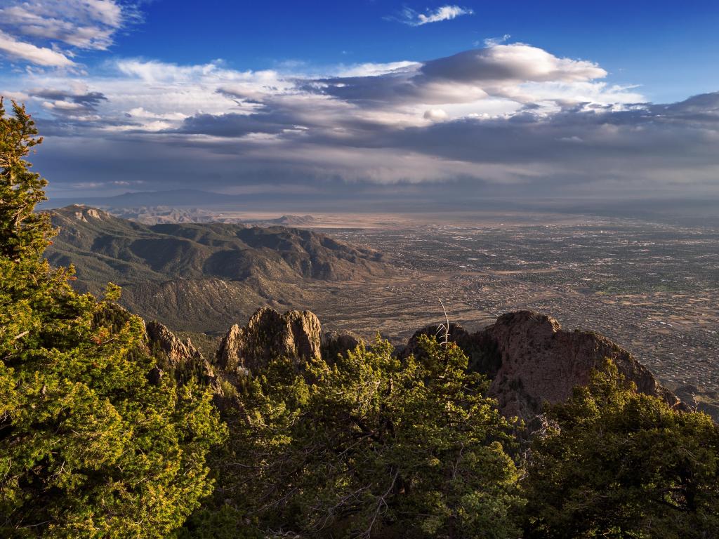 Albuquerque, New Mexico taken from the Sandia Mountain Crest and looking down at the city below on a cloudy but sunny day,