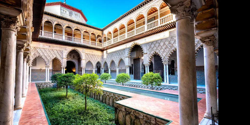 A beautiful moorish Alcazar courtyard on our Spain road trip