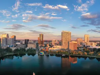 Orlando, Florida, USA taken from a drone shot at sunrise showing downtown Orlando.