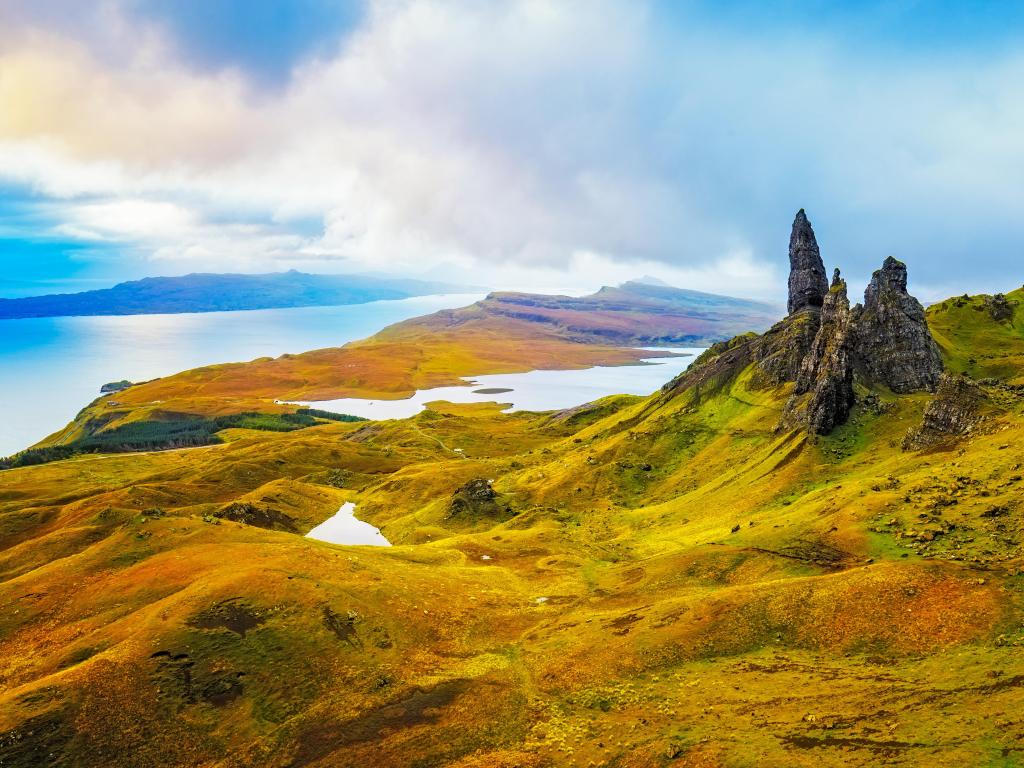 Trotternish Peninsula, Isle of Skye, Scotland, UK with a view of the Old Man of Storr rock formation, and valleys and sea beyond.