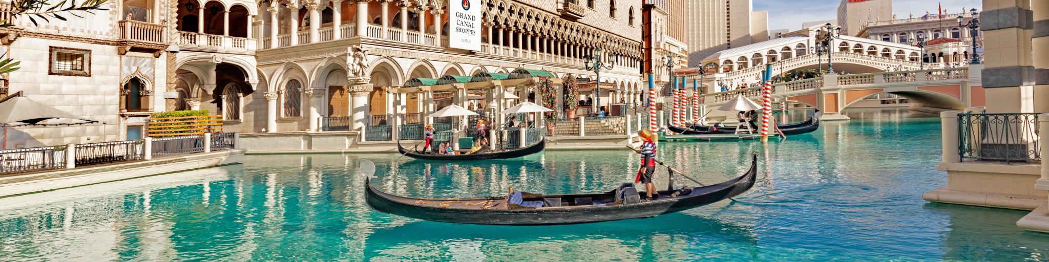 The pool of the famous Venetian Hotel with gondolas on a sunny day