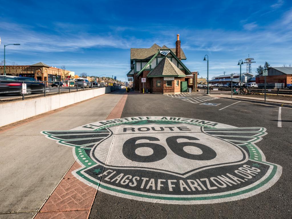 A road with a markings of Route 66, Flagstaff, Arizona which is in the historic train station.