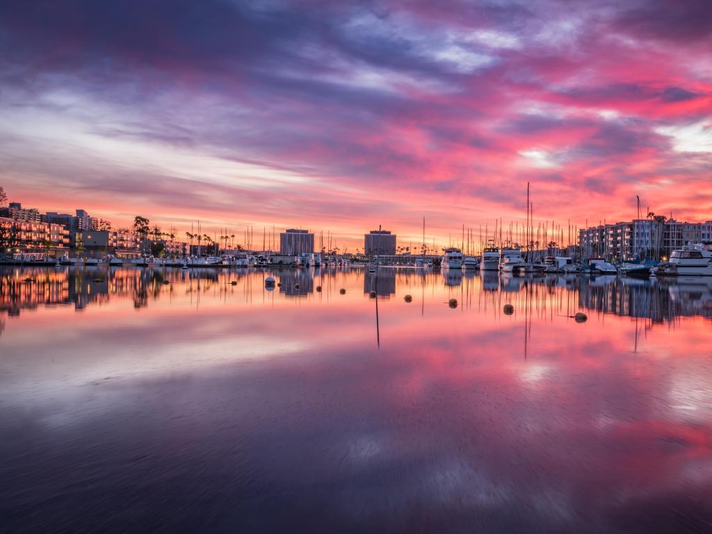 Playa del Rey, California, USA with reflections in Marina Beach at night.