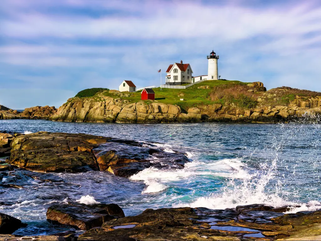 Nubble Lighthouse, York, Maine, USA taken on a sunny day with sea all around the island. 