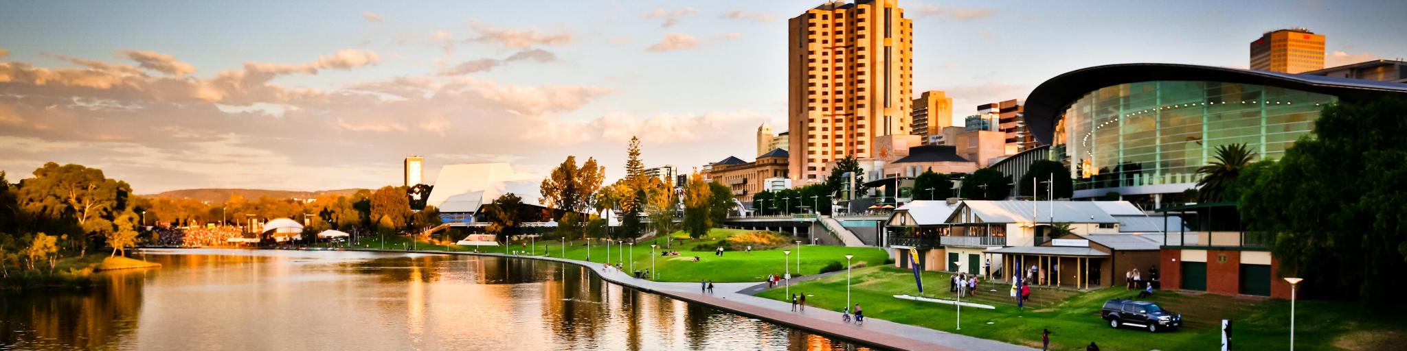 Adelaide skyline showing the river and buildings, with the reflection of the buildings in the river