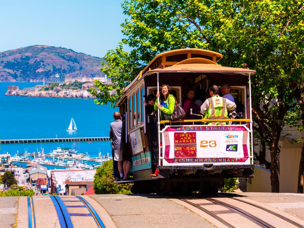 San Francisco Cable Car going downhill to the Bay in fine weather during April