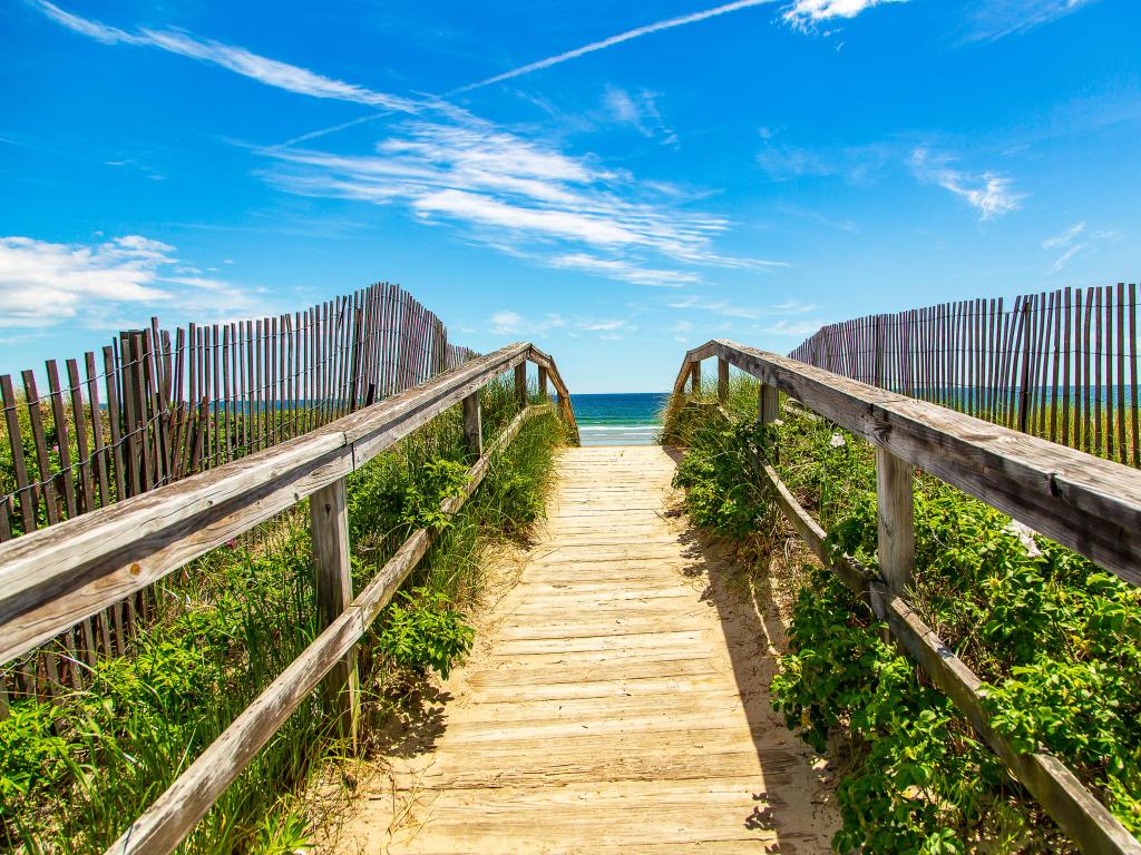 Ogunquit, Maine, USA with a pathway to the beach on a sunny clear day.