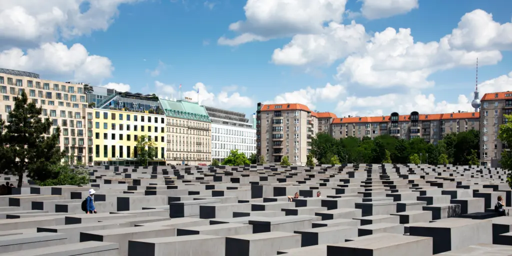 Visitors at the Memorial to the Murdered Jews of Europe, also known as Holocaust Memorial, in Berlin, Germany