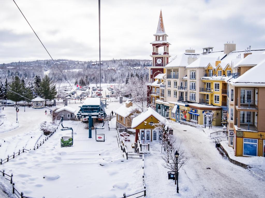 Mont Tremblant Village, Quebec with chairlift coming down the mountain