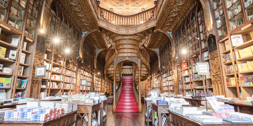 The magical staircase and ornate woodwork of Livreria Lello bookstore in Porto