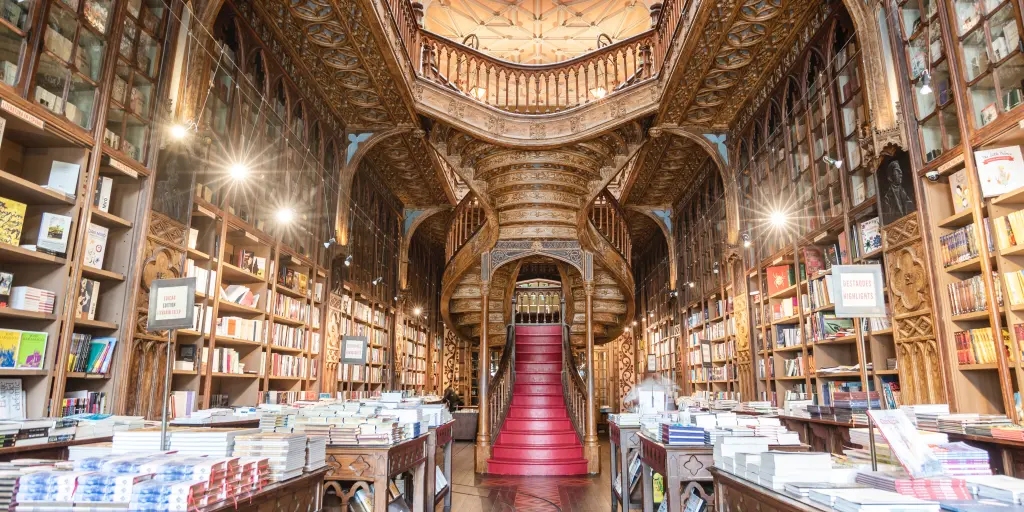 The magical staircase and ornate woodwork of Livreria Lello bookstore in Porto