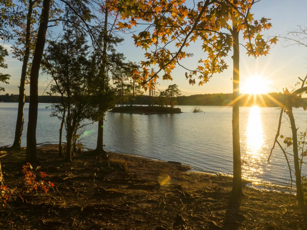 A scenic autumn view of a sunset over Lake Norman in North Carolina.