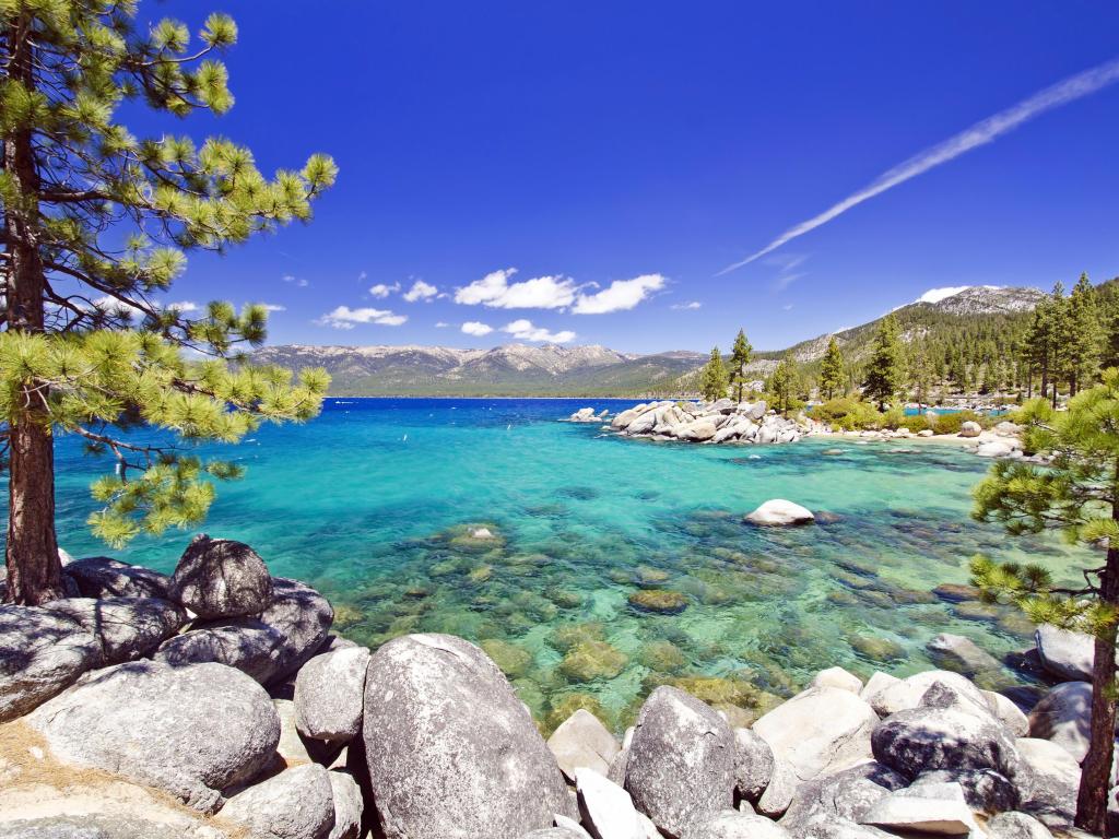 Beautiful Lake Tahoe beach on a sunny day with only a few clouds in sight