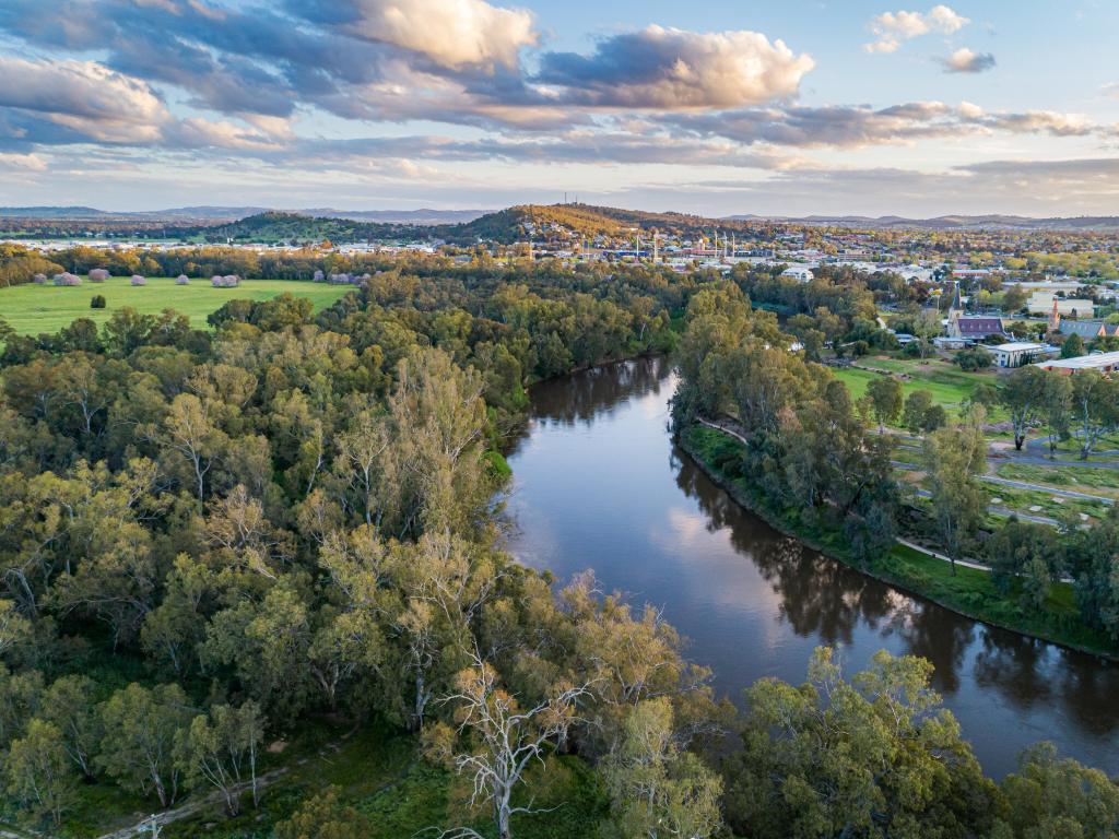 Wagga Wagga, Australia with a sunset over the Murrumbidgee River in Wagga Wagga aerial drone view.