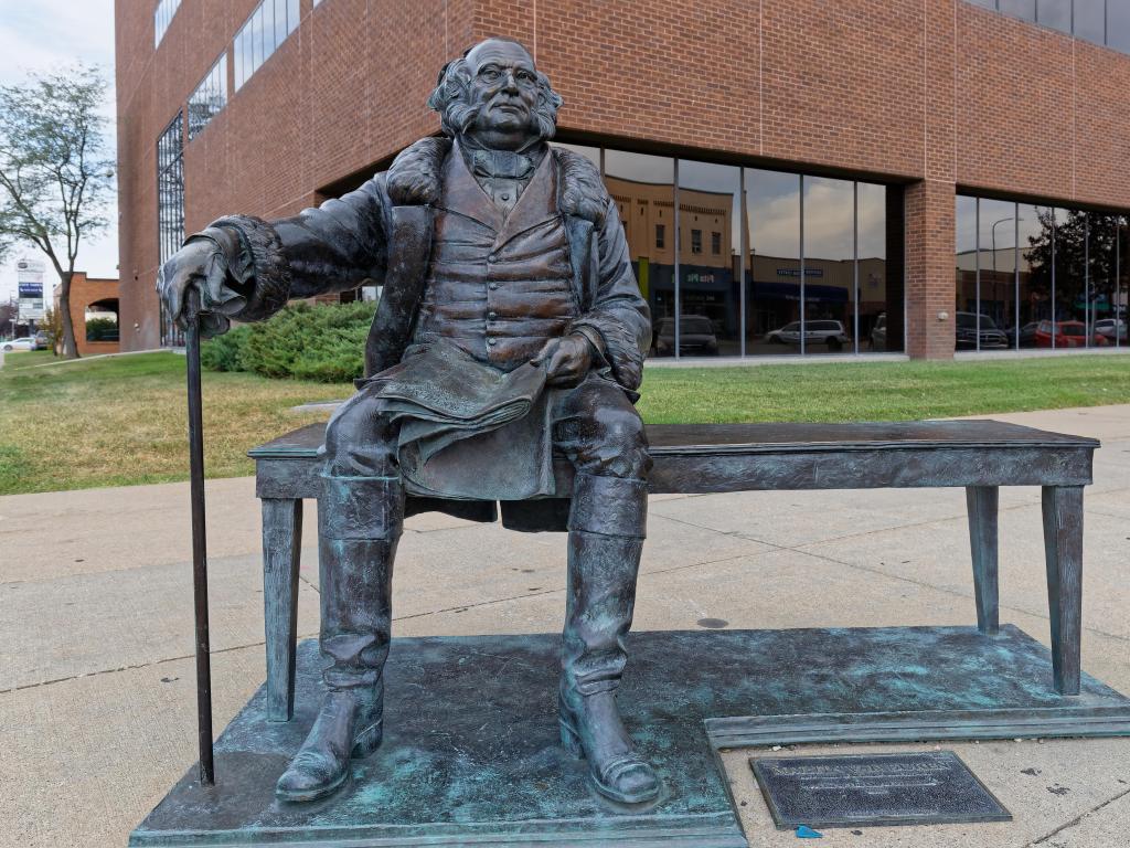 Martin Van Buren statue, sitting on a bench