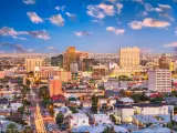 El Paso, Texas, USA downtown city skyline at dusk with Juarez, Mexico in the distance.