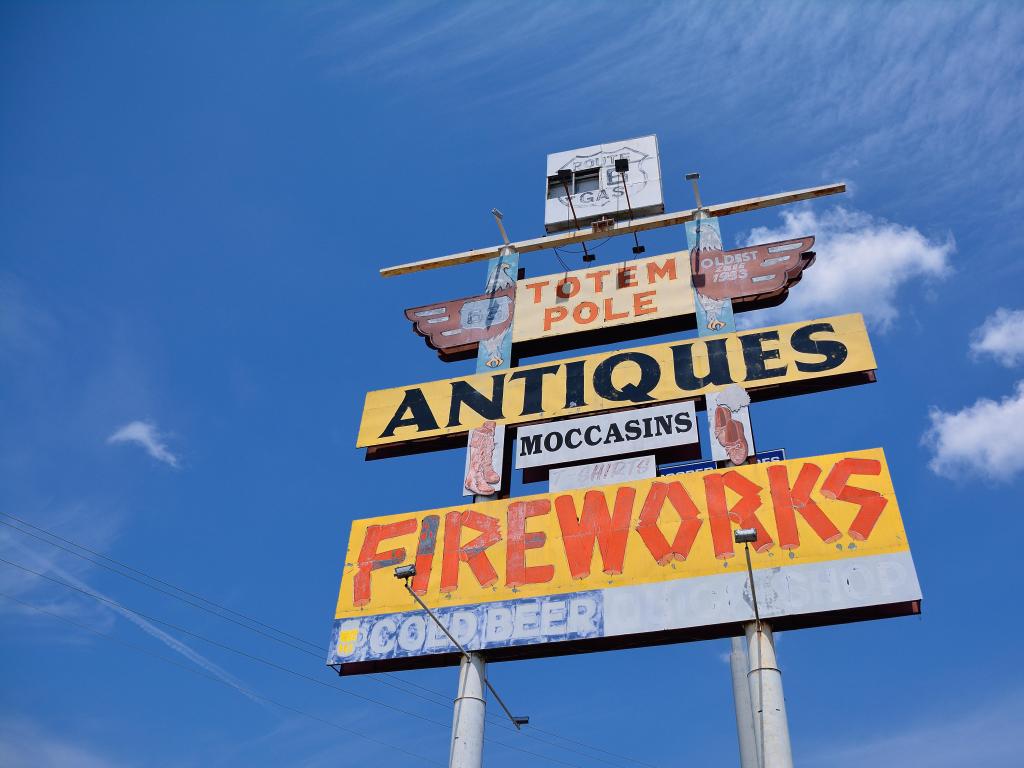 Vintage sign advertising Totem Pole Trading Post in Rolla, MO