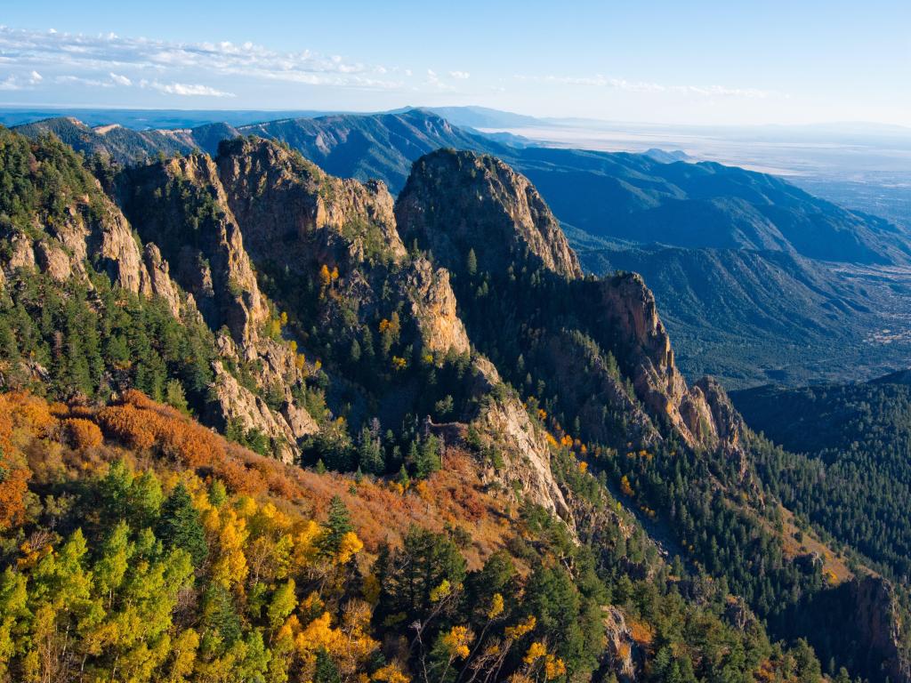 Sandia Peak, Cibola National Forest, New Mexico, USA taken at early sunset with a panoramic view of the Rio Grande Valley and the Land of Enchantment located east of Albuquerque in the Sandia Foothills on a sunny day.