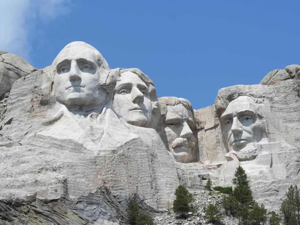 Mt. Rushmore, photographed from the base. Bright sunny day.