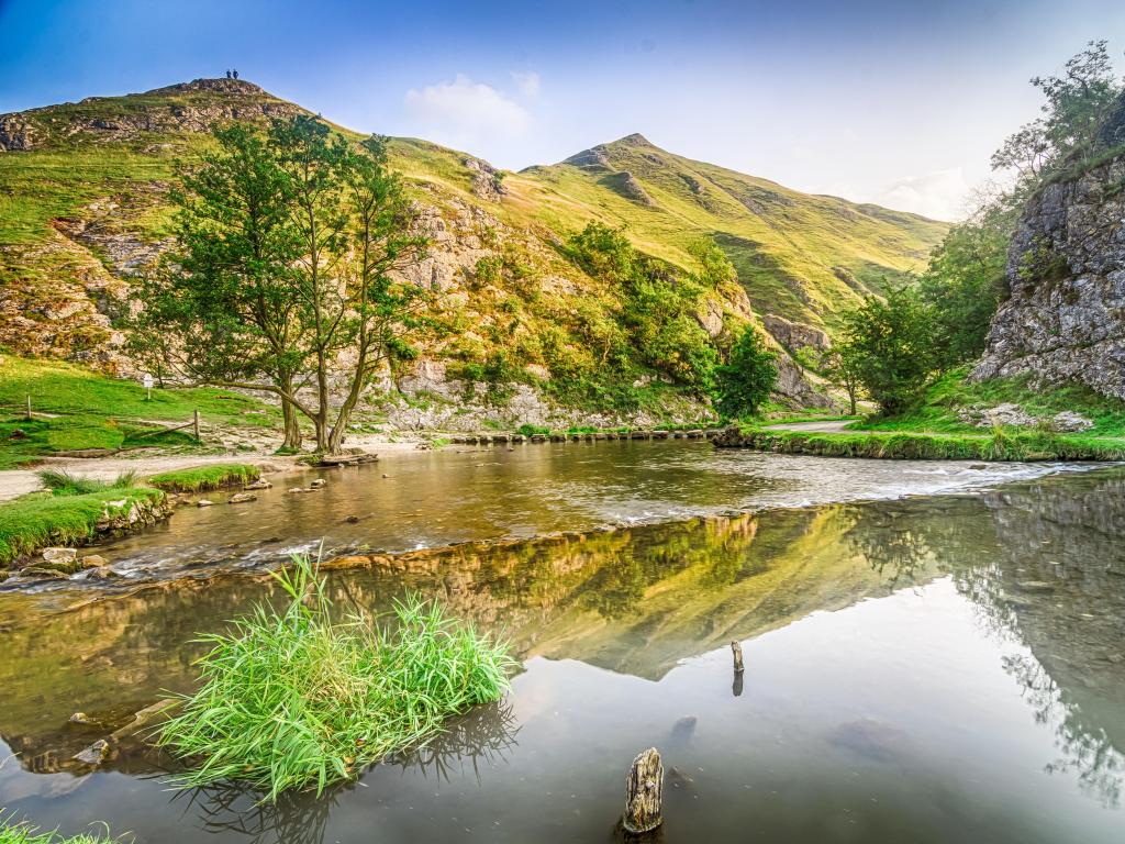 Peak District National Park, UK with a beautiful view of the river Dove and stepping stones at Dovedale in the English Peak District.