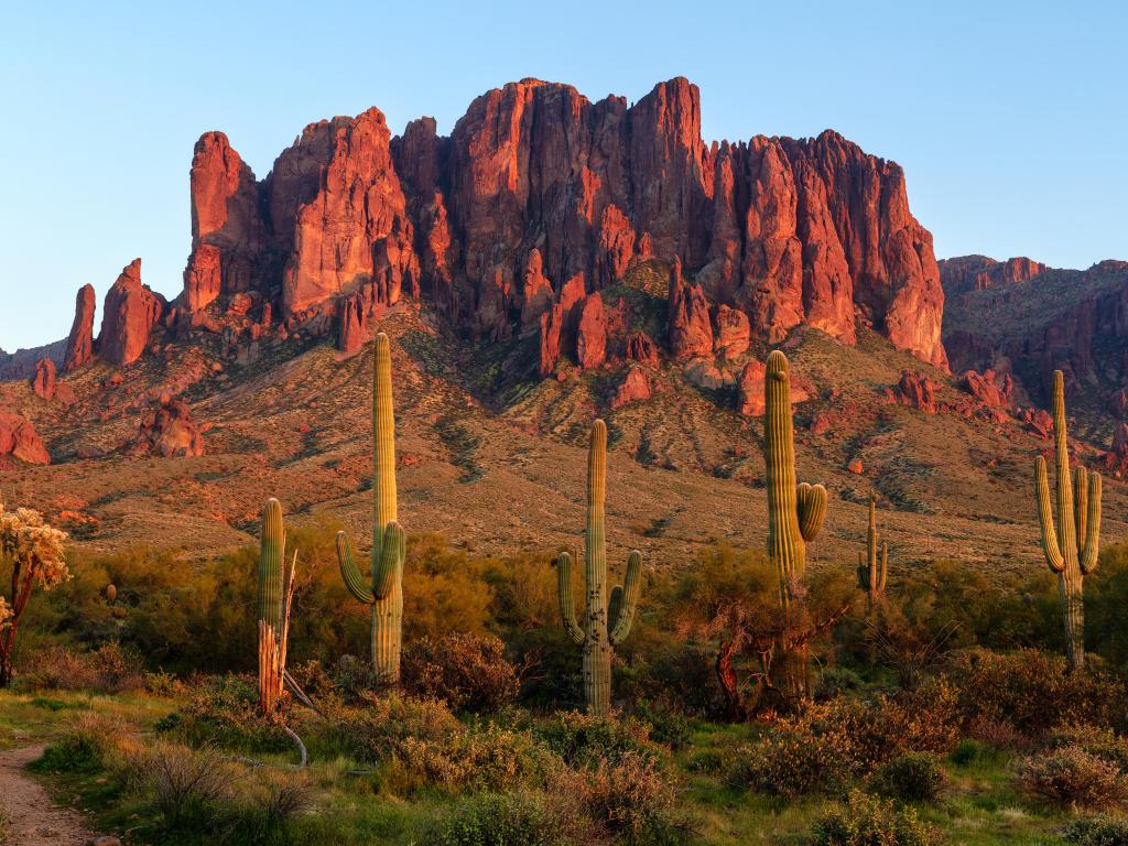 The Superstition Mountains and Sonoran desert landscape at sunset in Lost Dutchman State Park, Arizona.