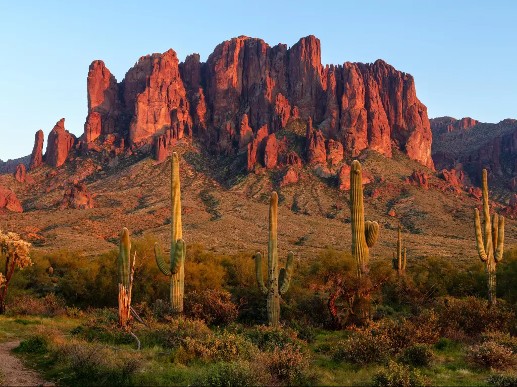 The Superstition Mountains and Sonoran desert landscape at sunset in Lost Dutchman State Park, Arizona.