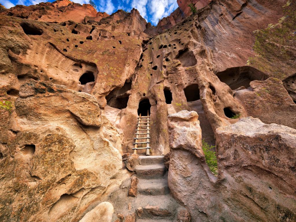 Bandelier National Monument, USA with a view of the cliff dwellings in the cliff face.