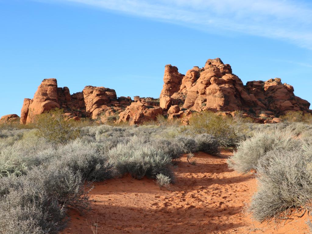 Red rock formations in the distance on a sunny day