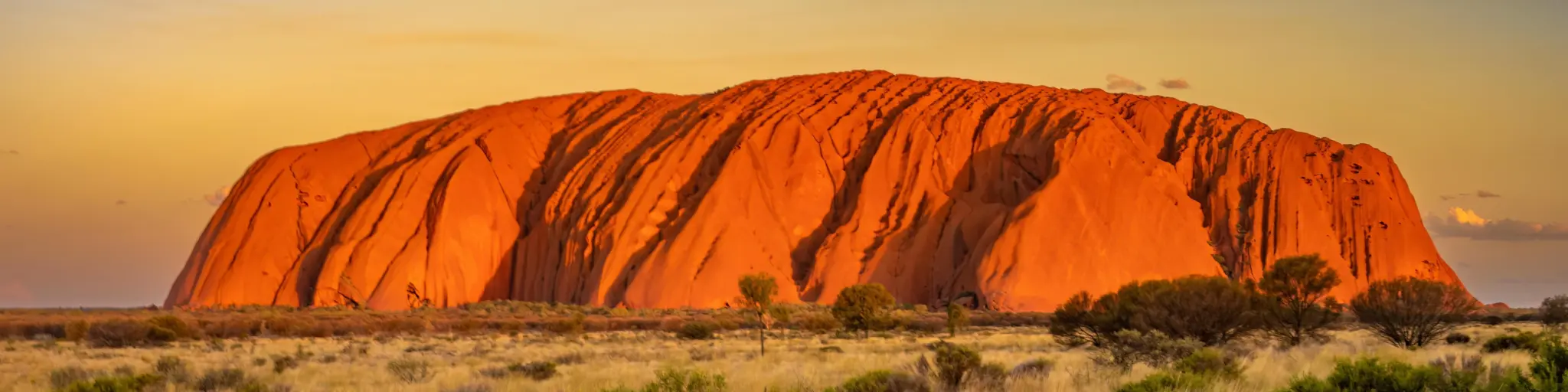 The iconic sandstone rock during an orange-blue sunset