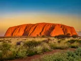 The iconic sandstone rock during an orange-blue sunset