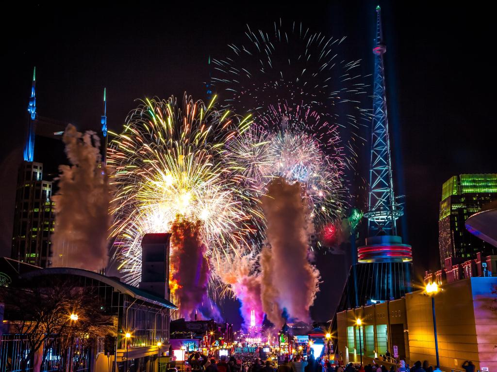 New Year's Party at night in Nashville with fireworks going off in the background.