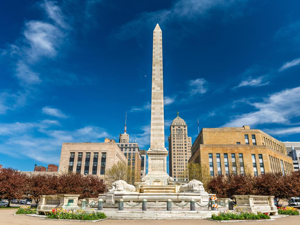 Buffalo, New York, USA with the McKinley Monument on Niagara Square in the foreground on a sunny day.