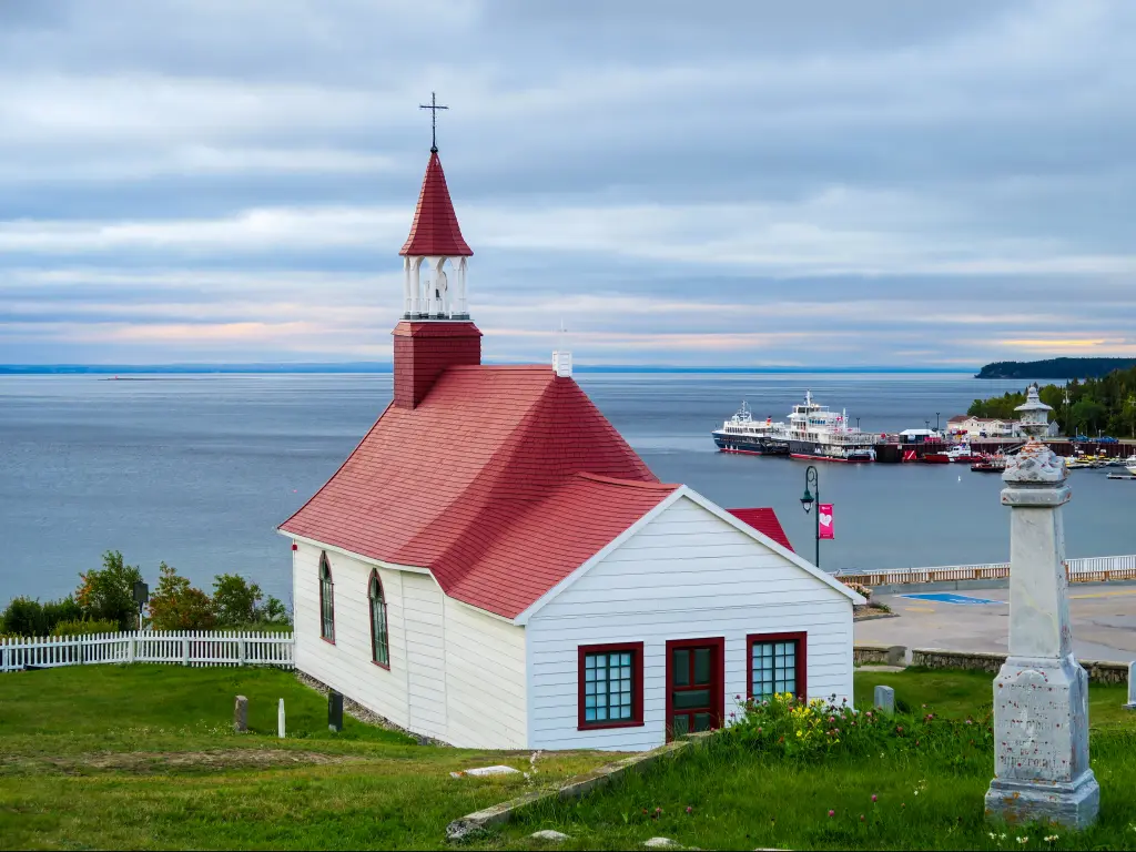 Tadoussac Chapel - Canada's oldest wooden church overlooking the St Lawrence River flowing into the Gulf of St Lawrence.