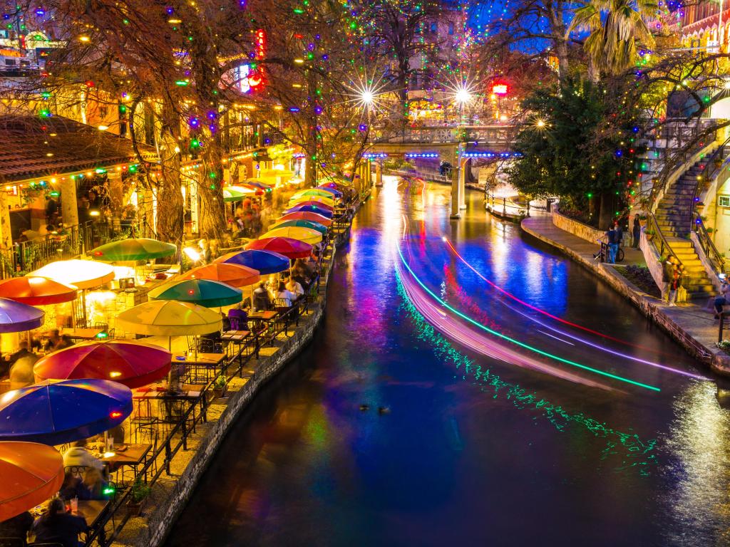 San Antonio, Texas, River Walk at night with colourful umbrellas beside the river and lights shining