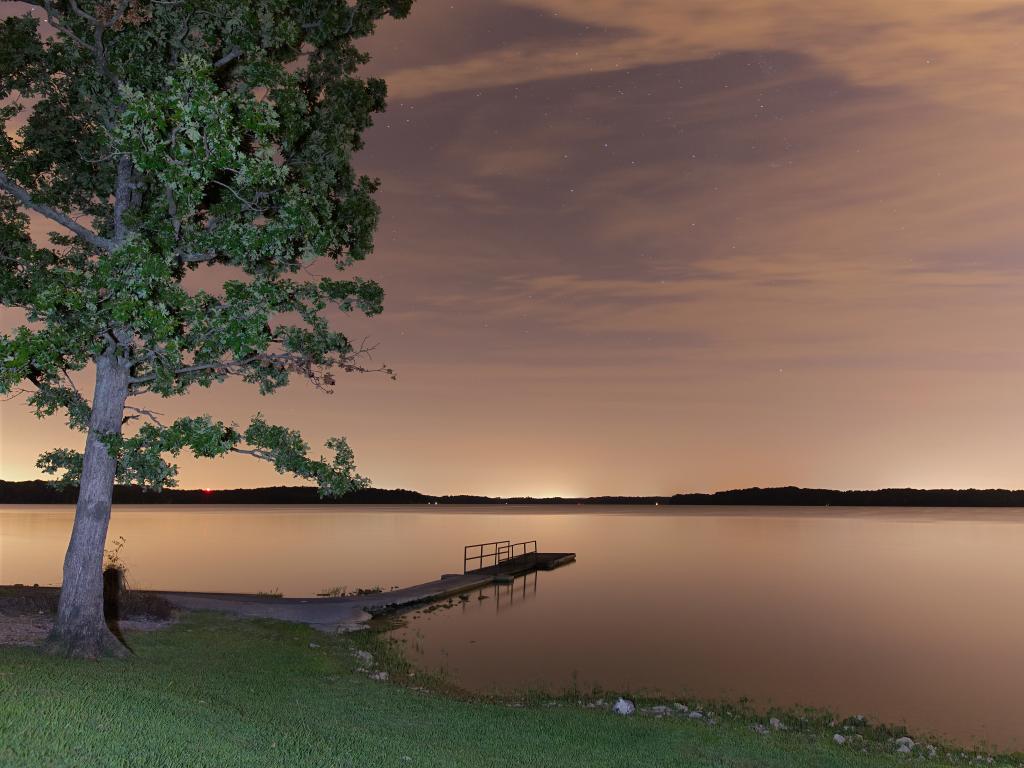 Sunset over a pier at the Percy Priest Lake in Nashville, Tennessee