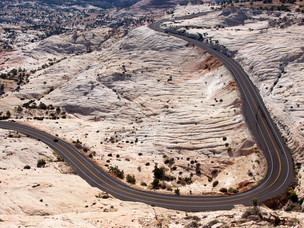 Highway winding in the desert with a sharp twist in the road