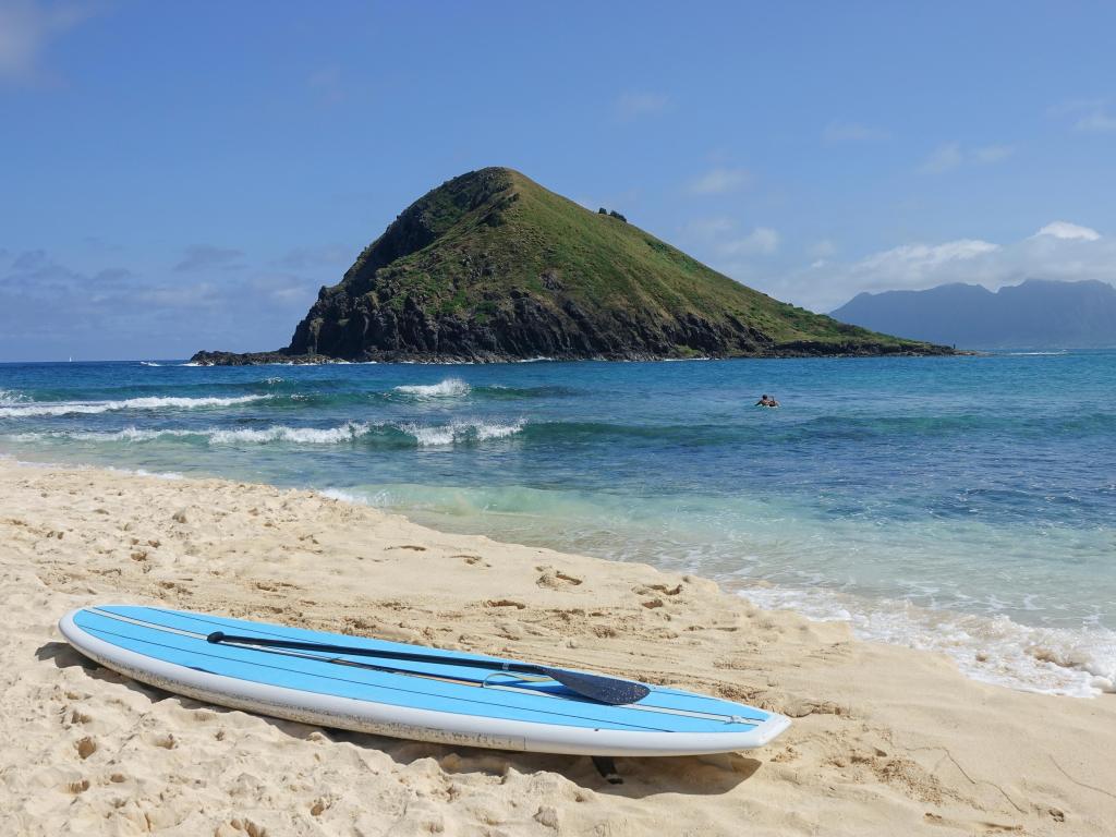 Sup board at Kailua beach in Oahu, Hawaii, with beautiful views of the sandy shore and turquoise waters