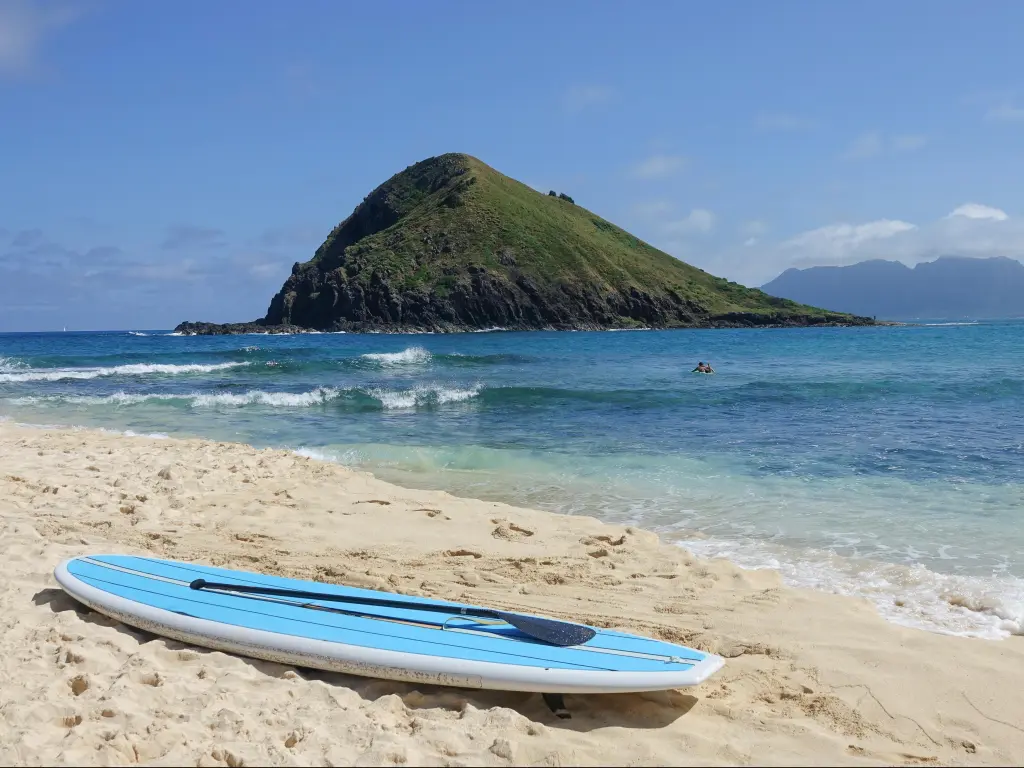 Sup board at Kailua beach in Oahu, Hawaii, with beautiful views of the sandy shore and turquoise waters