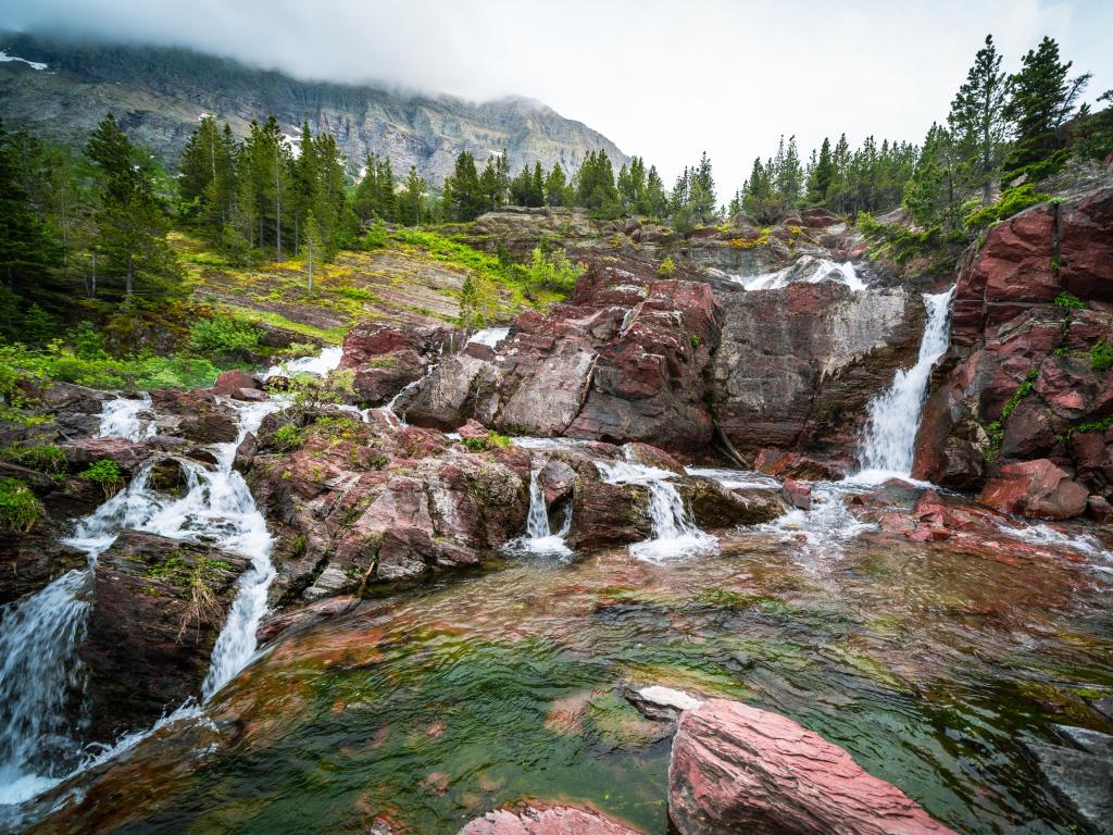 Glacier National Park, Montana, USA taken at RedRock Falls waterfall along the Swiftcurrent Pass trail.