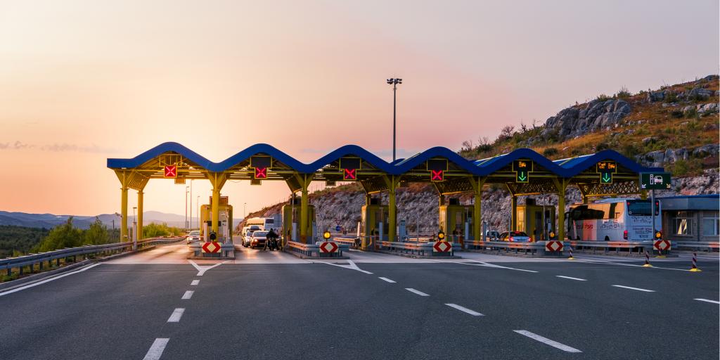 Cars pass through a toll road on a motorway in Croatia