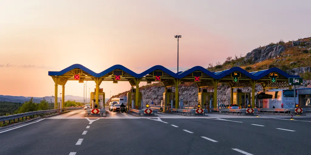 Cars pass through a toll road on a motorway in Croatia