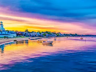Ships and boats in the Provincetown Marina during sunset Provincetown, MA
