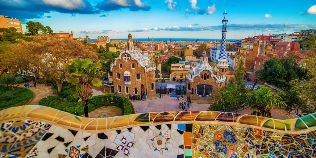 The colourful tiled walls of Park Guell in Barcelona