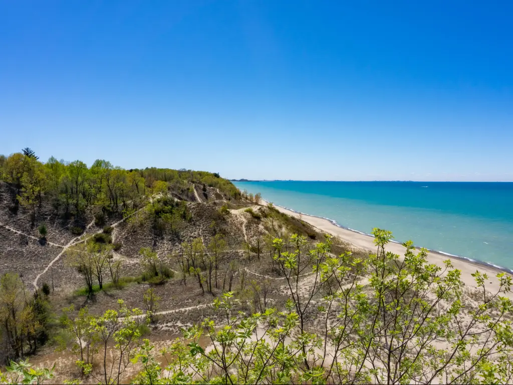 Indiana Dunes National Park, Indiana, USA with views of Lake Michigan and the sand dunes on a sunny clear day.