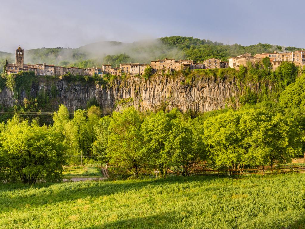 Castellfollit de la Roca sitting on top of a cliff in Catalonia, Spain