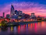 Nashville Skyline at sunset with buildings set against a purple sky