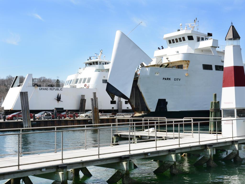 The ferries 'Park City' and 'Grand Republic' at dock in Port Jefferson on a sunny day