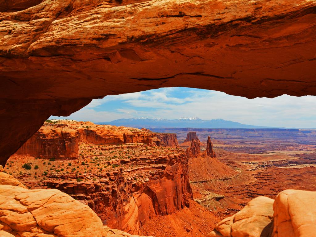 Canyonlands National Park, Utah, USA taken at the iconic Mesa Arch on a sunny day.