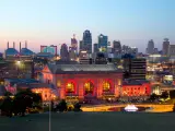 Nigh view of Kansas City with historic building lit up in red