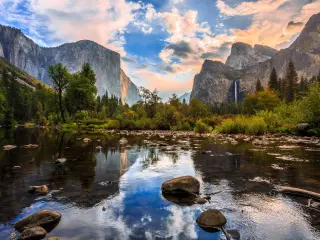 Colorful sunrise over the famous Yosemite Valley View on a cloudy day